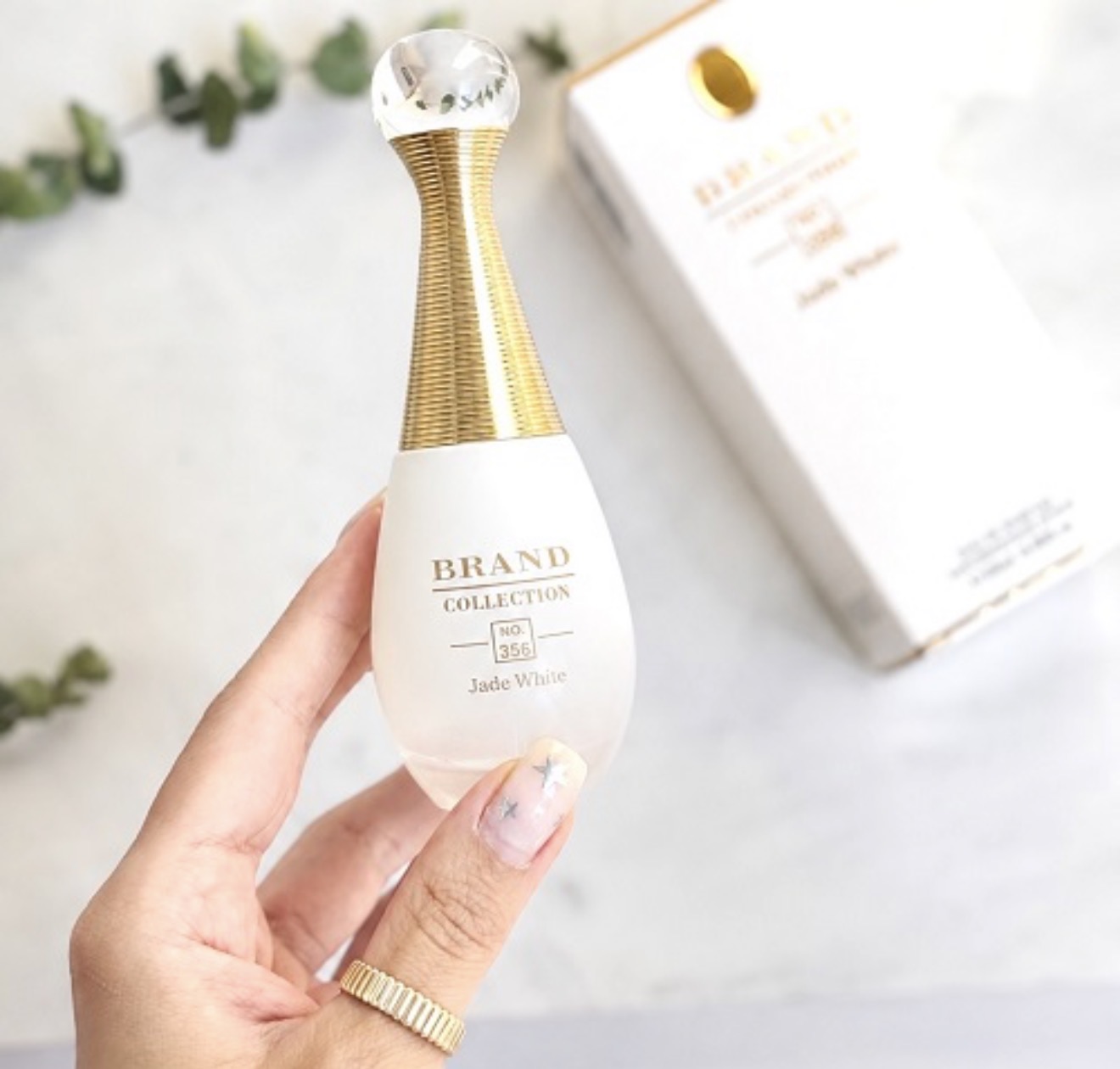 عطر ادکلن مینی دیور جادور پارفوم د او (دیور جادور سفید) برند کالکشن | Dior J’adore Parfum d’Eau (Brand Collection) حجم 25 میل کد 356(شرکتی)