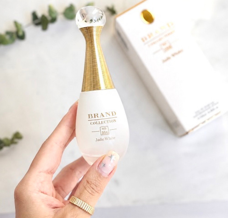عطر ادکلن مینی دیور جادور پارفوم د او (دیور جادور سفید) برند کالکشن | Dior J’adore Parfum d’Eau (Brand Collection) حجم 25 میل کد 356(شرکتی)